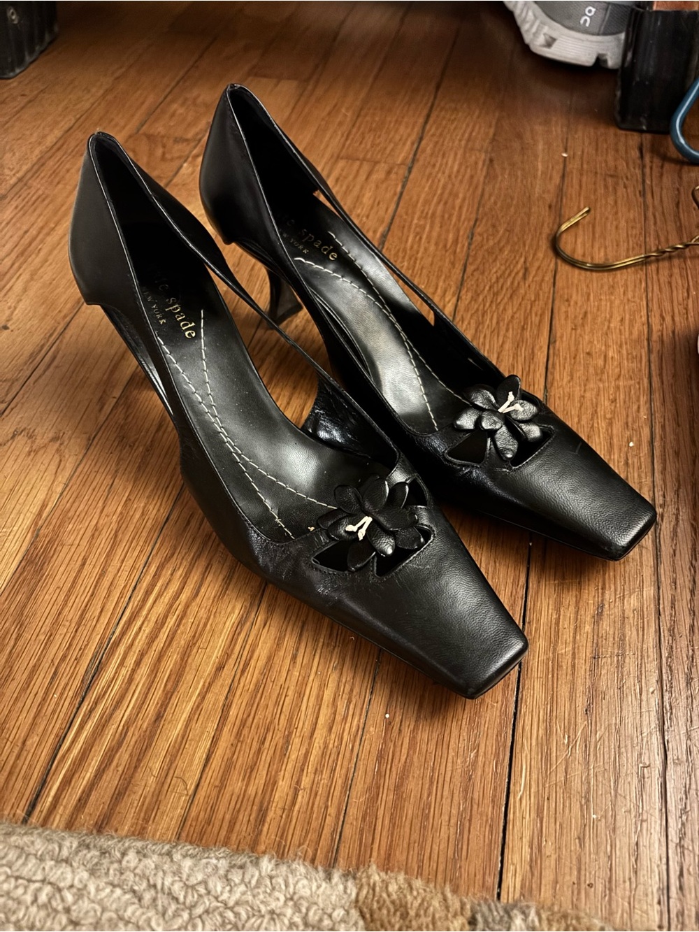 kate spade Black Leather Pointed Toe Pumps with Floral Accent